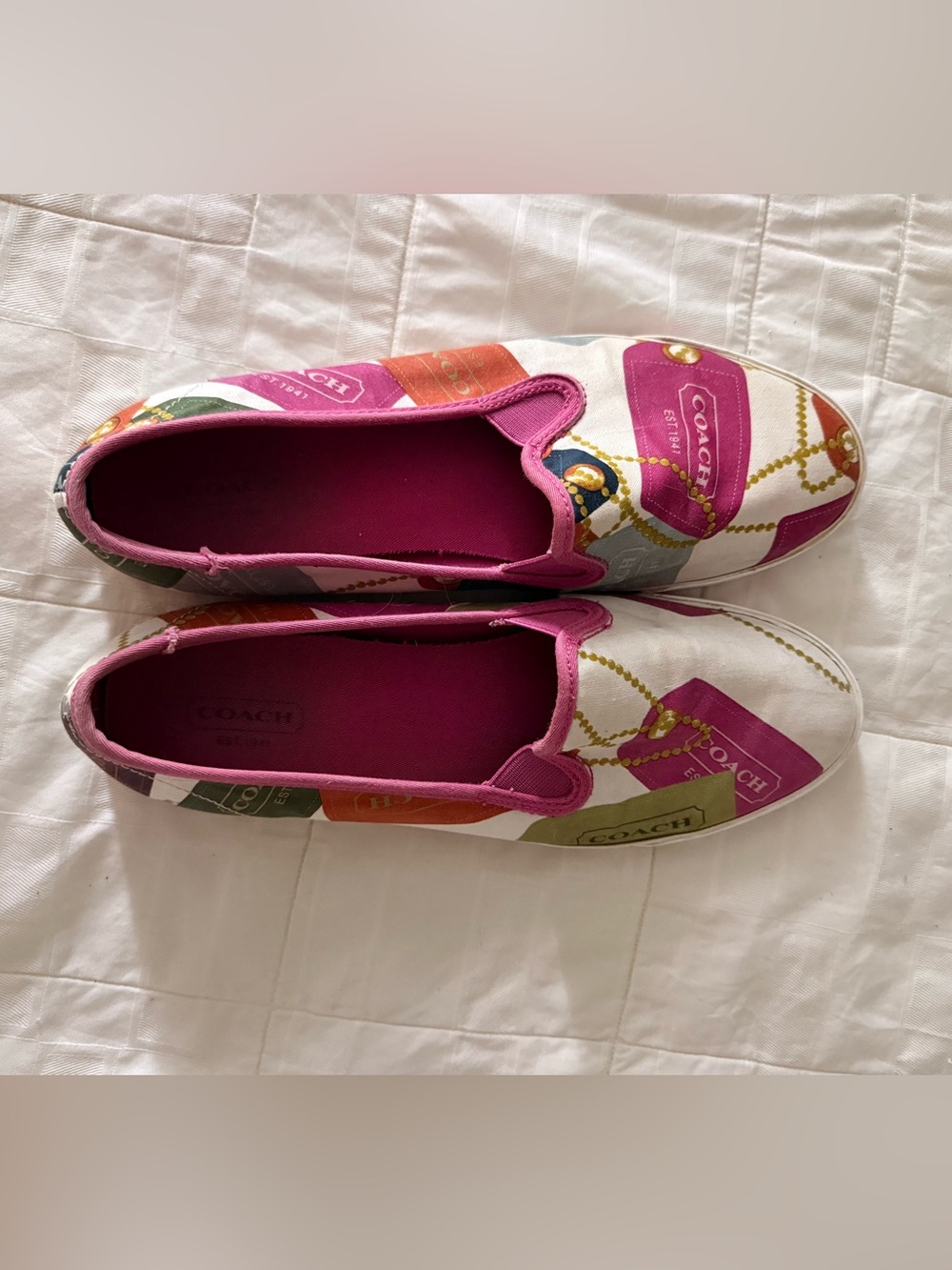 COACH White Canvas Slip-On Mules with Pink Accents and Multicolor Tag Print